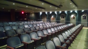 Empty auditorium with rows of seats