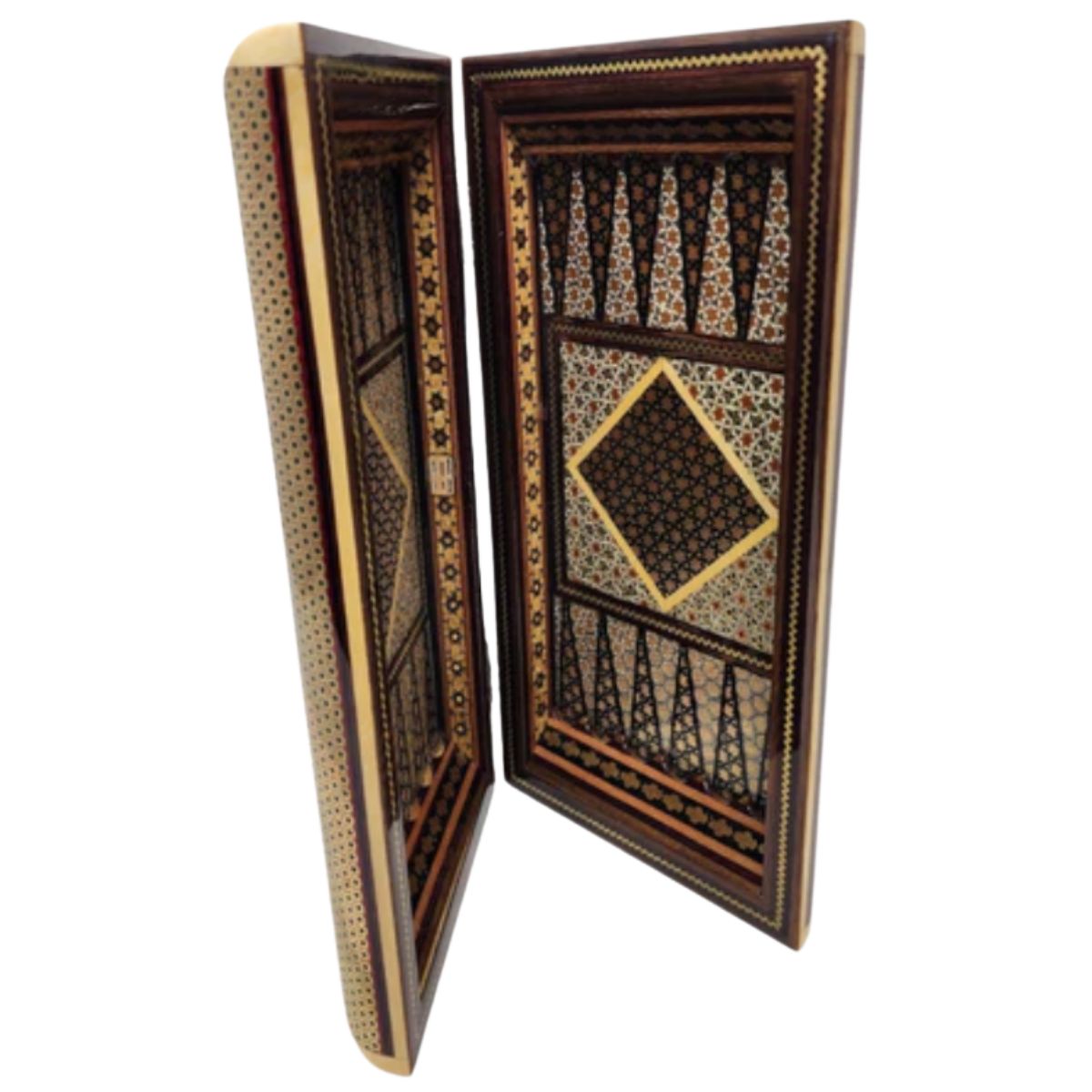 An heirloom-worthy game set that turns strategy into art, handcrafted with traditional inlay techniques. Handmade mosaic backgammon board with intricate geometric patterns and inlaid wood.