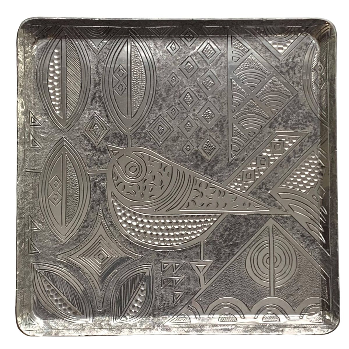This hand-etched tray showcases a pigeon surrounded by intricate geometric designs—honoring tradition with a modern twist. Square silver tray featuring a hand-etched pigeon design surrounded by intricate geometric and botanical patterns.