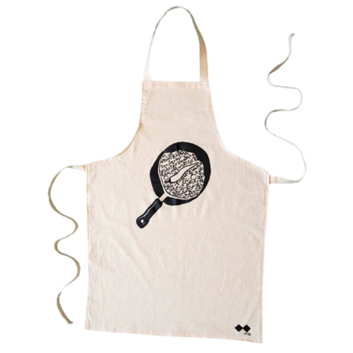 Hand-printed in Palestine, this apron brings Arab culinary culture to life—right on your chest. Natural cotton apron featuring a black graphic of a frying pan with Arabic text and intricate designs inside it.