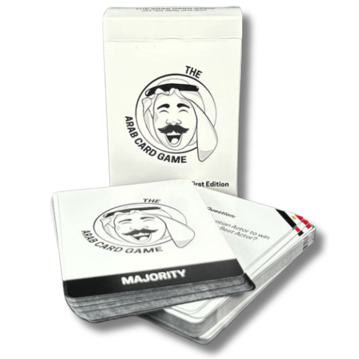 A party game with an Arab twist—laugh, debate, and bond over shared cultural quirks. The Arab Card Game box and playing cards, featuring a black-and-white cartoon logo of a smiling man in a keffiyeh, with some cards fanned out below.